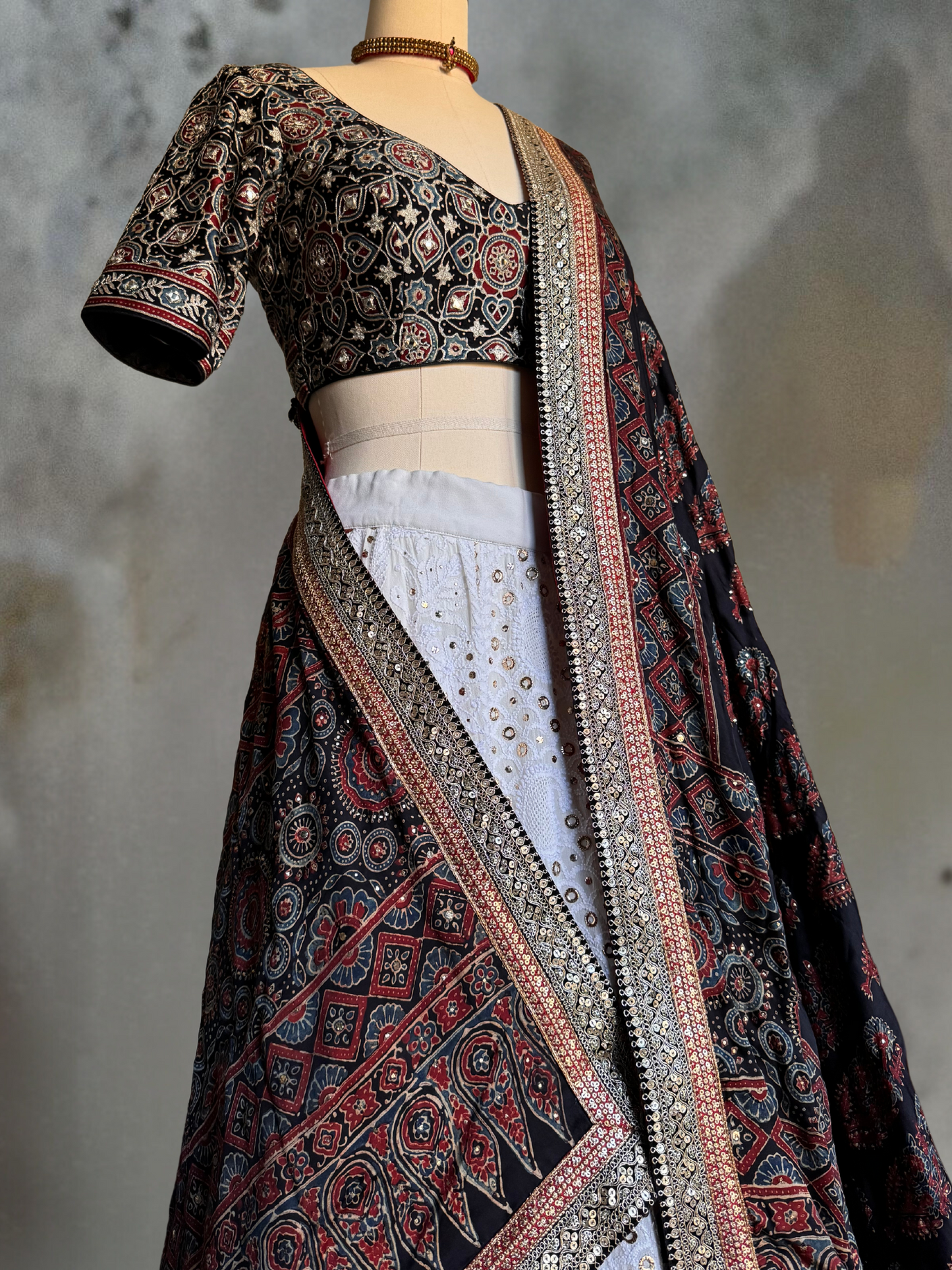 AJRAKH AND CHIKAN EMBROIDRED LEHENGA