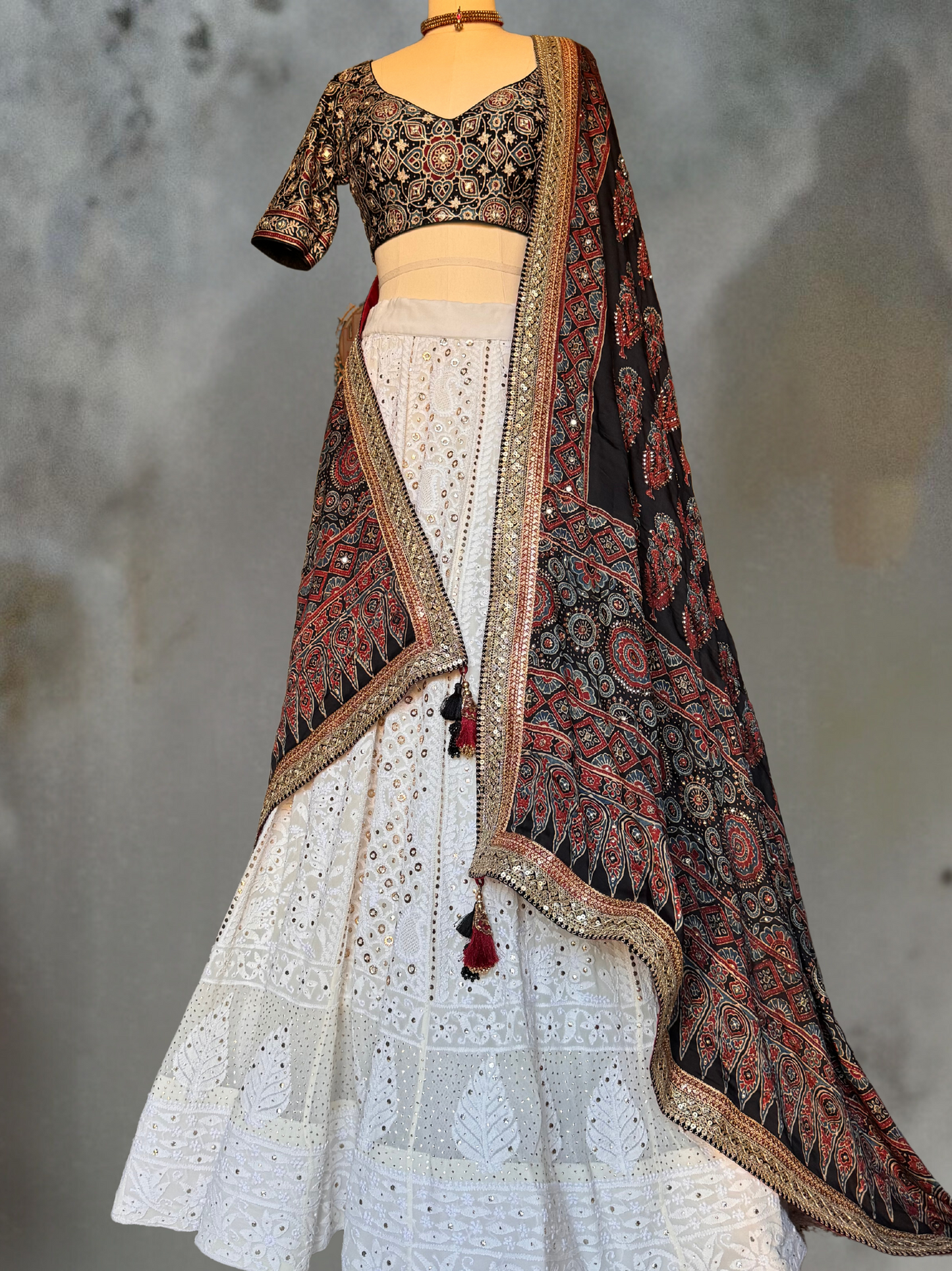 AJRAKH AND CHIKAN EMBROIDRED LEHENGA