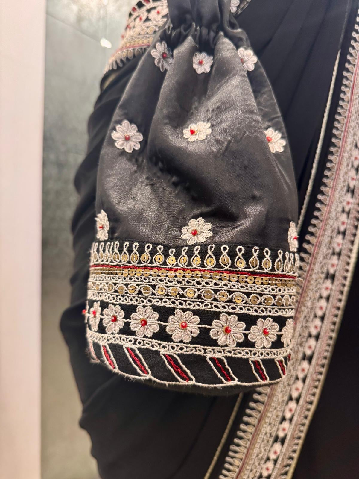 BLACK SILVER EMBROIDERED PRE DRAPED SAREE WITH POTLI